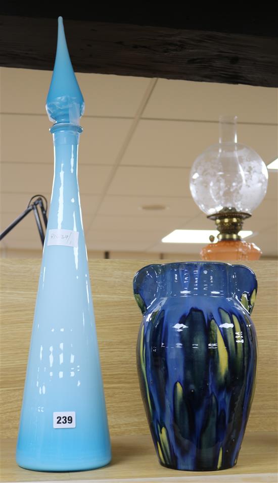 A large Italian glass jar and a pottery vase